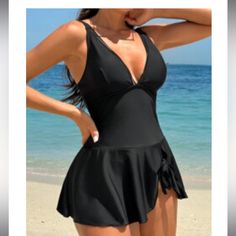 Nwt Black 2 Piece Bathing Suit. Top Is Skirted With Regular Bikini Bottom Underneath Black V-neck Summer Tankini, Black Lined V-neck Swimwear, Black V-neck Lined Swimwear, Chic Black Swim Skirt For Poolside, Fitted Black Tankini For The Beach, Black Lined Summer Tankini, Elegant Black Swim Dress For Pool, Chic Black Swim Dress For Poolside, Chic Black Swim Dress For Beach Season