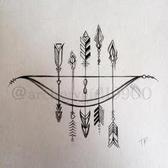 an arrow and arrows tattoo design on paper