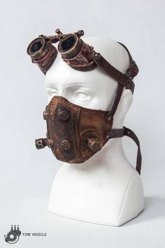 "Leather mask for post apocalytpic wanderer. Each mask element is made by hand, including belt buckles. \"Filters\" are made of brass. The whole outside part has softly realistic weathering. This would make an excellent addition to any post-apocalyptic or steampunk costume. All handmade, hand stitched, and shaped by me! The mask is a prop, it is not a real dust mask. Goggles are not included in the offer price, but you can found them here: http://etsy.me/2iPTHlQ Adjustable - It ties up with leat Diy Gas Mask, Steampunk Mode, Steampunk Outfits, Moda Steampunk, Motorcycle Mask, Steampunk Aesthetic, Mode Steampunk, Steampunk Mask, Style Steampunk