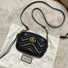 Great Condition(Almost Brand New); Marmont Mini 7"W X 5"H X 2.5"D; Black With Gold Hardware; No Stains Or Scratches; Comes With The Authentic Gucci Dust Bag High-end Black Gucci Shoulder Bag, Gucci Black Everyday Luxury Bags, Black Gucci Bag For Everyday Luxury, Everyday Luxury Black Gucci Bag, Gucci Marmont Mini Bag, Gucci Marmont Mini, Bags Gucci, Gucci Marmont, Gucci Bags