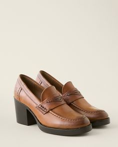 This menswear-inspired loafer gets a feminine lift from its fabulously heeled silhouette. Handcrafted in burnished leather with cushioning for comfort, plus raised heritage stitching on the toe, saddle, and back for extra style.  By Frye. Slip-on style. Cushioned footbed. Stacked leather block heel. Leather sole and man-made heel cap. Classic Fall Heels With Round Toe, Classic Platform Loafers With Leather Sole For Fall, Elegant Platform Loafers With Stacked Heel And Round Toe, Classic High Heel Platform Loafers For Office, Elegant Platform Loafers With Stacked Heel, Classic Platform Loafers With Block Heel For Work, Classic High Heel Platform Loafers For Work, Fall Wingtip Platform Loafers For Work, Fall Formal Platform Loafers With Almond Toe