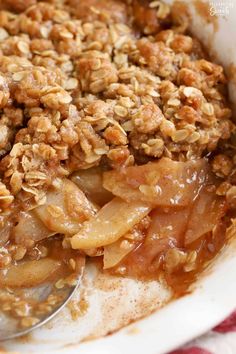 Closeup of an apple crisp in a white baking dish. Fruit Crisp Topping, Homemade Applesauce Recipes, Potato Souffle, Celebrating Sweets, Apple Tarte, Best Apple Crisp Recipe, Crisp Recipes, Best Apple Crisp, Easy Apple Crisp Recipe