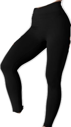 a woman in black leggings with her hands on her hips