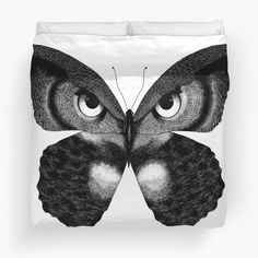 a black and white photo of a butterfly's face with big eyes duvet cover