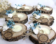 wooden slices with flowers and candles on them