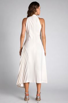 The Debby White Halter Neck Pleated Semi-Formal Dress offers timeless elegance for any special occasion. Featuring a chic halter neck and gracefully pleated skirt, this dress provides a flattering silhouette and sophisticated charm. The crisp white color and refined design make it ideal for semi-formal events, ensuring you look effortlessly stylish and poised. Perfect for weddings, receptions, or any elegant gathering where grace and class are key. Handmade customization Fabric composition: 90% Trendy Fringe, Weddings Receptions, Semi Formal Dress, Color Pairing, Elegant Accessories, Swimwear Sale, Halloween Dress, Model Pictures, Xl Dress