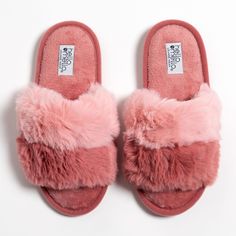 Slip into this super soft plush pair of women's faux-fur slide slippers and let the lounging begin! Cloud soft with a colorfully sweet cotton candy look, these slide slippers make every day a luxurious experience, plus with the fuzzy footbed your foot is covered in cozy comfort. Fluffy Round Toe Slippers For Loungewear, Fluffy Comfy Slippers For Loungewear, Comfy Fluffy Slippers For Loungewear, Comfy Pink Slippers With Cushioned Footbed, Comfortable Pink Slippers With Cushioned Footbed, Indoor Slippers With Plush Lining And Faux Fur, Soft Slippers For Winter Lounging, Fluffy Synthetic Slippers For Indoor Use, Soft Winter Slippers For Lounging