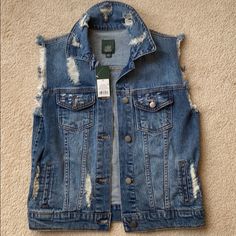 Distressed Sleeveless Denim Jacket. Nwt Never Worn. Spring Dark Wash Denim Vest With Frayed Hem, Ripped Cotton Denim Jacket For Summer, Summer Ripped Cotton Denim Jacket, Trendy Sleeveless Dark Wash Denim Vest, Summer Ripped Denim Vest In Denim Blue, Ripped Denim Blue Vest For Summer, Trendy Washed Denim Vest, Trendy Denim Blue Vest Outerwear, Summer Ripped Denim Blue Vest