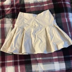 Xs Brand New Never Worn Cream Tennis Skirt Beige Stretch Mini Skirt For Summer, Fitted Summer Tennis Mini Skirt, Beige Stretch Pleated Skirt, Neutral Summer Skirt For Day Out, Neutral Skirt For Summer Day Out, Pleated Flared Skirt For Vacation, Beige Stretch Mini Skirt, Beige Stretch Skort, Spring Beach Tennis Skirt With Lining