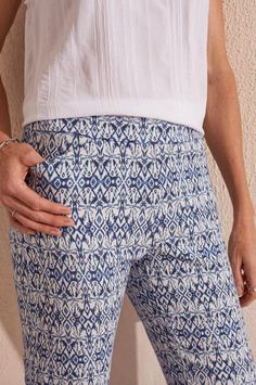 These pull-on capris are a low-maintenance pick that stays stylish with an intricate pattern in a soothing blue hue. We can't get enough of the elastic waist and stretch bengaline fabric that provides lasting comfort, flattering kick flare leg, 25" inseam, functional front pockets, and decorative back welt pockets. Pull-on elastic waist Kick flare leg 25" inseam Real front pockets, decorative back welt pockets 76% Rayon/Rayonne 21% Nylon 3% Spandex Machine wash delicate cycle cold water, separat Capri Trousers, Swimsuit With Shorts, Ikat Print, Kick Flares, Capri Blue, Swimsuit Dress, Dress Pant, Blue Star, Dress Romper