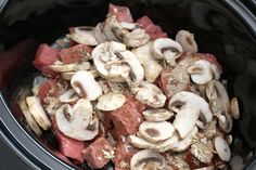 the meat and mushrooms are cooked in the slow cooker