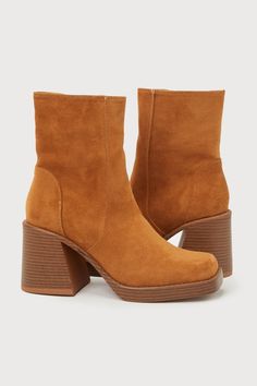 The Lulus Lenny Brown Suede Square Toe Mid-Calf Boots are about to be your go-to boot for all of your impressive looks this season! Smooth faux suede shapes these extra-cute boots with a square toe upper and a seamed vamp that rises to a 6.25"" mid-calf (all atop a 0.5"" toe platform). A 7"" zipper at the instep makes for easy on and off while a sculpted, wood-look block heel completes the modern look! 3. 25" stacked wood-look block heel. Cushioned insole. Felted rubber sole has nonskid markings Fall Suede Platform Boots Medium Width, Suede Platform Boots Medium Width For Fall, Trendy Suede Boots For Fall, Fall Suede High Ankle Platform Boots, Suede High Ankle Platform Boots For Fall, Brown Suede Platform Boots For Fall, High Ankle Suede Platform Boots For Fall, Trendy Suede Platform Boots For Fall, Trendy Suede Heeled Boots For Fall