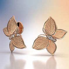 Experience Italian craftsmanship at its finest with our exquisite Diamond dangle drop earrings. The centerpiece of these earrings is a delicate butterfly with elegantly crafted leaves as its wings, creating a captivating and nature-inspired design. Available in both 14k and 18k gold, these earrings bring a touch of luxury and nature's beauty to your style. Elevate your look with the perfect blend of Italian artistry and organic elegance, shop now to adorn yourself with this unique masterpiece. 1 Italian Earrings, Diamonds Earrings, Delicate Butterfly, Jeweled Earrings, Italian Craftsmanship, Italian Jewelry, Nature Inspired Design, Ring Pendant Necklace, Butterfly Shape