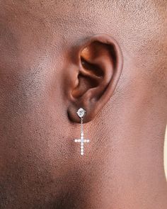 The earring everyone’s been asking for: the Hanging Cross Stud Earring. This unique men’s silver earring has a studded cross dangling from a 1ct diamond simulant stud for delicate movement and maximum style. Mens Earrings Studs, Cross Earrings Studs, Solid Gold Chains, Diamond Simulant, Stone Studs, Cross Earrings, Silver Shop, Single Earring, Silver Earring