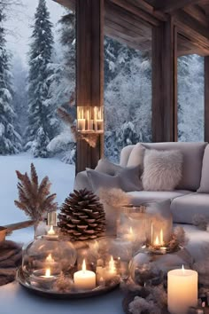 a living room filled with lots of candles and snow covered furniture in front of a window