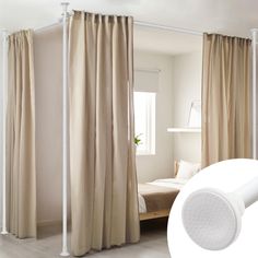 a bedroom with curtains and a bed in the background, next to a white curtain rod