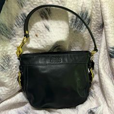 Coach Handbag, Soft Black Leather With Gold Hardware. Nwot, Never Carried. Comes From A Smoke Free Home. Approx Measurements: 8.5”W X 7”H Handheld Leather Bucket Bag With Gold-tone Hardware, Coach Shoulder Bag With Gold-tone Hardware For Everyday Use, Black Bucket Hobo Bag With Gold-tone Hardware, Coach Shoulder Bag For Everyday, Black Handheld Hobo Bag For Formal Occasions, Coach Bucket Bag With Gold-tone Hardware For Everyday Use, Coach Handheld Shoulder Bag With Gold-tone Hardware, Coach Leather Bucket Hobo Bag, Coach Top Handle Bucket Bag For Everyday Use