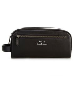 From Polo Ralph Lauren, this travel case features:"Polo Ralph Lauren" and signature Pony embossed at the frontleather handled at one sidetop zip closureone zip pocket at the exteriorone zip pocket at the interior5" H x 10" W x 4¼" Dshell: leatherlining: polyesterImported. Designer Wallet With Removable Pouch For Travel, Designer Travel Wallets In Pouch Shape, Designer Travel Wallet Pouch, Designer Travel Pouch Wallets, Leather Travel Cases With Leather Trim, Luxury Travel Wallet Pouch, Designer Leather Travel Wallet, Black Leather Travel Wallet, Leather Travel Wallets Rectangular Shape