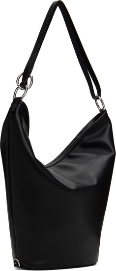 Buffed leather shoulder bag in black. · Convertible crossbody strap · Logo stamp at face · D-rings at base · Zip closure · Zip pocket at interior · Microsuede lining · H13 x W15.5 x D4.25 Part of the Proenza Schouler White Label collection. Supplier color: Black Shoulder Bag With Silver-tone Hardware And Round Handle, Modern Evening Hobo Bag With Silver-tone Hardware, Black Convertible, D Rings, Leather Bucket Bag, Black Leather Bags, Leather Bucket, White Label, Logo Stamp