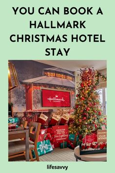 a christmas tree with presents in front of it and the words you can book a halmark christmas hotel stay