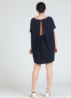 KAAREM - Angle Mini Dolman Open Back Dress - Black Blue Chic Button-back Dress For Date Night, Chic Mini Dress With Cowl Back, Chic Evening Dress With Button Back, Chic Evening Dresses With Button Back, Chic Short Sleeve Dress With Button Back, Chic Short Sleeve Button Back Dress, Chic Mini Dress With Button Back, Mini Dress With Draped Sleeves For Work, Workwear Mini Dress With Draped Sleeves