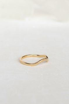 An asymmetric contour, perfect for any stack. This ring is endlessly versatile. Stack it, flip it, twist it. Wear it everyday. Select from solid yellow, white or rose gold and either high polish or matte finish. - 14k recycled gold - 1.5mm band This ring is handmade to order. Please allow up to 2 weeks to make and ship. Contour Ring, Cleaning Stone, Hanging Necklaces, Recycled Gold, Everyday Jewelry, Matte Gold, Solid Yellow, Or Rose, Yellow White