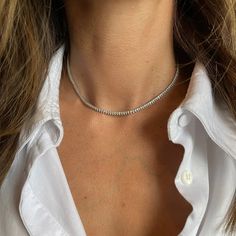 Lorena Diamond Tennis NecklaceThe classic Lorena Tennis Necklace. This piece is perfect to start your collection! With a unique design, you can choose between yellow, rose, or white gold. • 18K Yellow, Rose, or White Gold • Diamond: approximately 3.10 carats • 3/4 diamond necklace with a chain to adjust from 14-16-inch Dazzling Tennis Necklace For Everyday Luxury, Dazzling Solitaire Necklace With Single Cut Diamonds, Minimalist Tennis Necklace For Anniversary, Minimalist Tennis Necklace With Vvs Clarity, Elegant Vvs Clarity Solitaire Necklace, Everyday Luxury Diamond White Diamond Necklace, Timeless Silver Diamond Cut Necklace, Elegant Silver Solitaire Necklace With Single Cut Diamonds, Dazzling Everyday Diamond Necklace