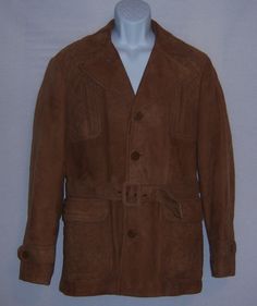 "Vintage Pioneer Wear Albuquerque tan or caramel brown soft suede field shooting jacket or coat. Excellent pre-owned condition. No holes, rips, tears, etc. Men's size 40 or MEDIUM. Measurements: chest-42\", waist-38\", length-31\". Button front. 100% suede. Lined. Belted waist. Made in Taiwan. Super buttery soft suede leather. Quilted shoulders front and back." Brown Rugged Sport Coat For Hunting, Rugged Brown Sport Coat For Hunting, Brown Long Sleeve Outerwear For Hunting, Brown Single Breasted Suede Outerwear, Brown Long Sleeve Hunting Outerwear, Brown Leather Hunting Outerwear, Vintage Suede Outerwear With Pockets, Rugged Brown Suede Outerwear, Vintage Brown Single-button Outerwear