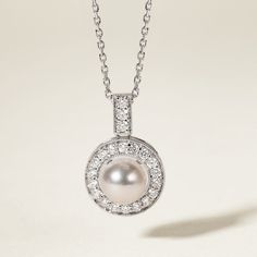 Experience Timeless Elegance with Akoya Pearls Material: Akoya Pearl, 18K white gold and diamond (S925 Silver Chain) Akoya pearl saltwater cultured pearl 1 pearl 6.5-7.0mm 21 diamonds about 0.315 carats in total Size of Pendant: 12.0*18.5 mm Handpicked of every pearl, only the top 1% of pearls are selected Handcrafted Lifetime warranty Classic Platinum Necklace For Wedding, Classic Akoya Pearl Diamond Necklace For Anniversary, Luxury Pearl Charm Round Jewelry, Luxury Round Pearl Charm Jewelry, Timeless White Gold Diamond Necklace For Wedding, Classic White Gold Diamond Necklace For Wedding, Classic White Gold Necklace For Wedding, Classic Pearl Necklace With 17 Jewels For Wedding, Classic Pearl Necklace With Diamond Accents For Anniversary