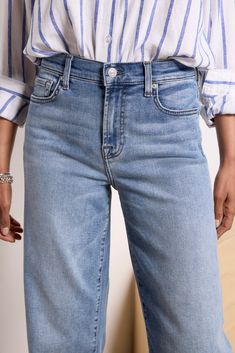 A cropped wide leg creates the chic silhouette of these 7 For All Mankind jeans. Perfect for day-to-night wear, the Alexa features raw ankle-length hems and soft stretch denim fabric in a faded blue wash. | 7 FOR ALL MANKIND Women's Cropped Alexa w Raw Hem Jeans, Size 25, Blue Article On Raw Hem Pants, Stretch Denim Fabric, Raw Hem Jeans, Hem Jeans, Fashion 101, Night Wear, 7 For All Mankind Jeans, Fall Shopping, Tee Dress