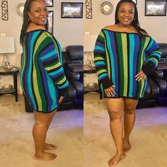 a woman standing in front of a couch wearing a multicolored striped sweater dress