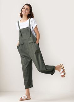 "Convenient pockets add functionality, making these overalls a must-have for your wardrobe. A casual chic look has never been so comfortable. FEATURES - 100% linen  -Button detail  -Front and back Two pockets -Loose fit -Over sized Fit -Ankle Length -For Summer, spring, autumn -Wash by hand or machine with cold water * The model is 165 cm (5′ 5″) tall with a 80 cm (31.5\") bust, 66 cm (26\") waist. She is wearing the overalls in size XS. ★★Bespoke Order Service If you Request other color Request the length Your height is not between 155 cm- 175 cm Your weight is not between 47 kg -77 kg I can do it for you, It will need some extra fee depending on on your need. Contact with me for more detail. ★★Get your size in Size Chart with your body measurement https://www.etsy.com/listing/794055682 ★ Solid Color Cotton Overalls For Work, Solid Cotton Jumpsuits And Rompers With Pockets, Cotton Jumpsuits And Rompers With Pockets, Casual Green Solid Color Overalls, Utility Bib Front Jumpsuits And Rompers For Summer, Casual Baggy Jumpsuits And Rompers For Work, Relaxed Fit Linen Overalls With Pockets, Casual Relaxed Fit Jumpsuits With Slip Pockets, Utility Style Khaki Jumpsuits And Rompers With Pockets