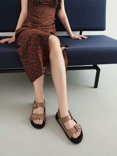 Editor's NotesRareness' shoes are designed for comfortable and basic styles.- Bold buckled double strap sandals- Cushioned sole bottom- Subtle glossy leather- Easy slide-in design- Modern almond toe shapeMeasurements(in.)- Size: KR 225MM (US 5.5) ~ KR 250MM (US 8)- Heel Height: 1.2 in.*Fits true to size.Composition & Care- Calf Leather- Lining: Pigskin Leather- Insole: Kidskin Leather- Avoid direct heat and moisture- Professional cleaning is recommendedDesigner- by rareness Beige Open Toe Sandals With Tang Buckle, Beige Sandals With Buckle Closure And Single Toe Strap, Beige Flat Slingback Sandals With Buckle, Beige Flat Slingback Sandals With Buckle Closure, Beige Double Strap Sandals With Buckle Closure, Double Strap Footbed Sandals With Heel Strap, Summer Footbed Sandals With Tang Buckle And Flat Heel, Beige Footbed Sandals With Buckle Closure And Round Toe, Summer Double Strap Footbed Sandals With Tang Buckle