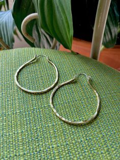 These big mommas are 2.5 inches. They are hand formed from brass wire with a sterling silver hook that goes through your ear. These beauties are my take on a classic hoop that you will wear for years to come!! Artisan Earrings, Mixed Metals, Brass, Sterling Silver, Silver