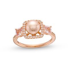 Dare to dazzle in this stylish cultured pearl, white lab-created sapphire and diamond fashion ring. 10K rose gold The ring showcases a 7.0mm dyed pink freshwater cultured pearl center stone A squared frame of shimmering diamonds surrounds the pearl 4.0mm cushion-cut white lab-created sapphires flank each side Additional diamonds line the ring's slender shank, completing the look 1/5 ct. t.w. of diamonds Luxury Rose Gold Diamond Pearl Ring, Fine Jewelry Pearl Ring With Diamonds In Rose Gold, Elegant Rose Gold Pearl Ring With Diamond, Cultured Pearl Ring, Freshwater Pearl Ring, Pearl Rose, White Lab, Diamond Fashion Rings, Fashion Ring