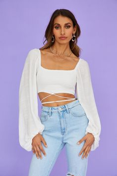 Length from shoulder to hem of size S: 34cm. Crop top. Cold hand wash only. Model is a standard S and is wearing size S. True to size. Stretchy fabric. Polyester. Keep Styling Daily, with this cute AF crop! You'll be slaying 24/7 with this top; long sleeves, straight neckline and V-line hem. Style yours with mid rise jeans and mules. V Line, Straight Neckline, Cold Hands, Children Shoes, Hem Style, Exclusive Fashion, Mid Rise Jeans, Stretchy Fabric, Mid Rise