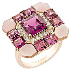 This lovely pinkish-red rhodolite ring is set in an octagon shape! The mother of pearls that embrace the ring's four corners add to its beauty and elegance. This trendy ring is suitable for any event or gathering. These gemstones with diamonds are set in rose gold for a rich and royal appearance. Rhodolite Fancy Ring in 18Karat Rose Gold with Pink Mother of Pearl, and White Diamond. Rhodolite: 3.18 carat, 8X8mm size, octagon shape. Rhodolite: 3.41 carat, 4.00mm size, princess shape. Pink Mother of Pearl: 2.88 carat, 5.00mm size, fancy shape. White Diamond: 0.25 carat, 1.50mm size, round shape, G color, VS clarity. Gold: 6.736g, 18Karat Rose Gold. R1678 Octagon Shape, Fancy Rings, Trendy Ring, Four Corners, Mother Pearl, Jewelry Lover, White Diamond, Luxury Jewelry, Or Rose