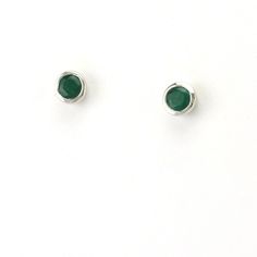 Silver Emerald .5ct 4mm Round Post Earrings Minimalist Silver Earrings For May Birthstone, Modern Silver Earrings With Birthstone, Modern Silver Birthstone Earrings, Sterling Silver Round Cut Earrings For May Birthstone, Sterling Silver Earrings With Bezel Setting As Gift, Round Silver Earrings With Bezel Setting, Silver Earrings With Bezel Setting - Fine Jewelry, Silver Earrings With Bezel Setting In Fine Jewelry Style, Emerald Earrings In White Gold