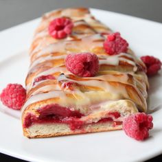 raspberry filled pastry on a white plate