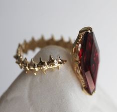 SNAKE SKELETON STATEMENT RING Unique Garnet Ring, Rose Gold Pictures, Snake Skeleton, Skeleton Ring, Poison Ring, Snake Ring, Garnet Ring, Ring Unique, Garnet Rings