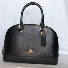 Brand New With Tags Coach Mini Sierra Satchel In Pnt Crossgrain Leather Crossbody Handbag Color:Black / Gold Hardware Handles With 3 1/2” Drop Longer Strap With 21 1/2” For Shoulder Or Crossbody Wear Size: 10 1/4” (L) X 7” (H) X 4” (W) Zip-Top Closure And Fabric Lining No Trades Coach Textured Leather Bag For Formal Occasions, Formal Coach Bag With Textured Leather, Formal Coach Textured Leather Bag, Elegant Black Textured Leather Satchel, Coach Textured Leather Satchel For Formal Use, Elegant Black Coach Satchel, High-end Black Bags For Work, High-end Black Bags For Workwear, Coach Textured Leather Evening Satchel