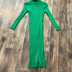 Fitted Sweater Dress Green Ribbed Long Sleeve Midi Dress, Green Long Sleeve Ribbed Midi Dress, Winter Green Ribbed Midi Dress, Fitted Midi Sweater Dress For Spring, Green Long Sleeve Mini Dress For Winter, Chic Green Maxi Dress For Fall, Green Long Sleeve Bodycon Midi Dress, Long Green Dresses For Fall, Casual High Neck Sweater Dress For Spring