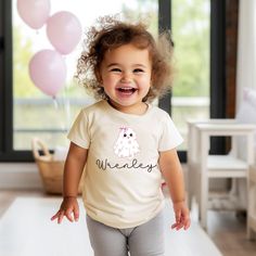 Personalized Halloween Kids Shirt, Custom Kids Name Cute Boo Toddler, Halloween Ghost Kids Tee, Fall Baby Outfit, Halloween Baby Shower Gift A T-shirt is a daily must-have item you should have in your wardrobe. Our designed T-shirts are quite easy for you to wear or mix with other items. Above all, it's extremely convenient and suitable for any gender. You can wear our designs anywhere you want: at home, at a gym, or hang out with friends. Our shop wants to bring you trendy, quality and cost-effective shirts. PRODUCT DETAILS: Printed in the USA Worldwide shipping Print type: DTG Material: Cotton and polyester Sizing: Depending on colors and styles Style: Classic t-shirts, hoodies, sweatshirts, tank tops, youth T-shirts, baby bodysuits, etc Can be printed on both sides The second side: + $4 Cute Cartoon Print Top For First Birthday, Cute Cartoon Print Tops For First Birthday, Cute First Birthday T-shirt With Character Print, Fall Baby Clothes, Outfit Halloween, Custom Kids, Toddler Halloween, Halloween Baby, Fall Baby