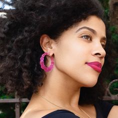 Our bamboo hoops are a Queens must-have. These are a classic 90s hoop, but with a 2022 twist! PRODUCT DETAILS 14K GOLD PLATED STERLING SILVER HANDCRAFTED PINK LUCITE 2" HOOPS STYLE NUMBER: E100SGTEP SHIPPING COMPLIMENTARY SHIPPING* SHIPS FROM NEW YORK WITHIN 1 BUSINESS DAY *DOES NOT SHIP TO PO BOXES Trendy Pink Hoop Jewelry, Modern Pink Hoop Earrings, Modern Pink Small Hoop Earrings, Modern Pink Small Hoop Jewelry, Pink Hypoallergenic Round Hoop Earrings, Pink Hypoallergenic Small Hoop Earrings, Hypoallergenic Small Hoop Pink Earrings, Pink Hypoallergenic Hoop Earrings, Pink Hypoallergenic Hoop Jewelry