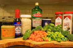 broccoli, cauliflower, carrots and other ingredients on a cutting board