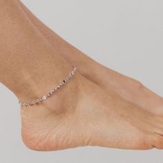 Our Italian-made Specchio Mirror Chain Anklet is a fun, flirty, and fashionable addition to your anklet collection! The Double Strand Specchio Mirror Chain Anklet is sure to be your new "go-to" accessory for fun in the sun or an elegant evening out. Options: Also Available in Gold SEE ALL ANKLETS PRODUCT DETAILS Size: 9"+1" extension, including clasp Closure: Lobster Clasp Metal: .925 Sterling Silver Finish: Rhodium (prevents tarnishing) Trendy Silver Anklets For Party, Silver Anklets With Adjustable Chain For Parties, Silver Adjustable Chain Anklets For Party, Trendy Silver Adjustable Anklets, Trendy Silver Anklets With Adjustable Chain, Trendy Silver Adjustable Chain Anklets, Silver Party Anklets Ankle Wrap, Silver Ankle Wrap Anklets For Party, Silver Metal Ankle Strap Anklet