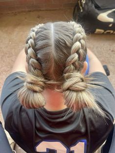 Gameday hair dutch braids with buns sporty hairstyles Dragon French Braid, Cute Hairstyles For Running, Dutch Braid Hairstyles For Softball, Sport Updos, French Vs Dutch Braid, Dutch Braid Into Bun, Cute Game Day Hairstyles Volleyball, Braids With Buns