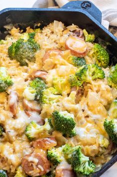 a casserole dish with broccoli, ham and cheese in it is ready to be eaten