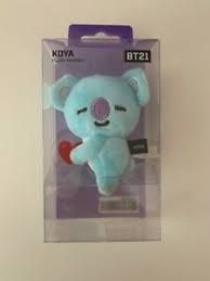 a blue stuffed animal in a package