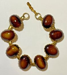 Vintage Scarab Style Brown Agate Oval Glass 7.25" Gold tone Link Bracelet 9J 4 | eBay Caramel Color, Colorful Bracelets, Antique Jewellery, Photography Props, Bracelets And Charms, Link Bracelets, Vintage Watches, The Ordinary, Favorite Things List